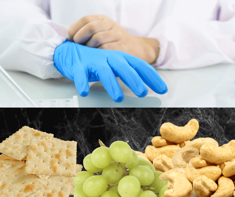 A gloved hand reaches for grapes, cashews and saltine crackers.